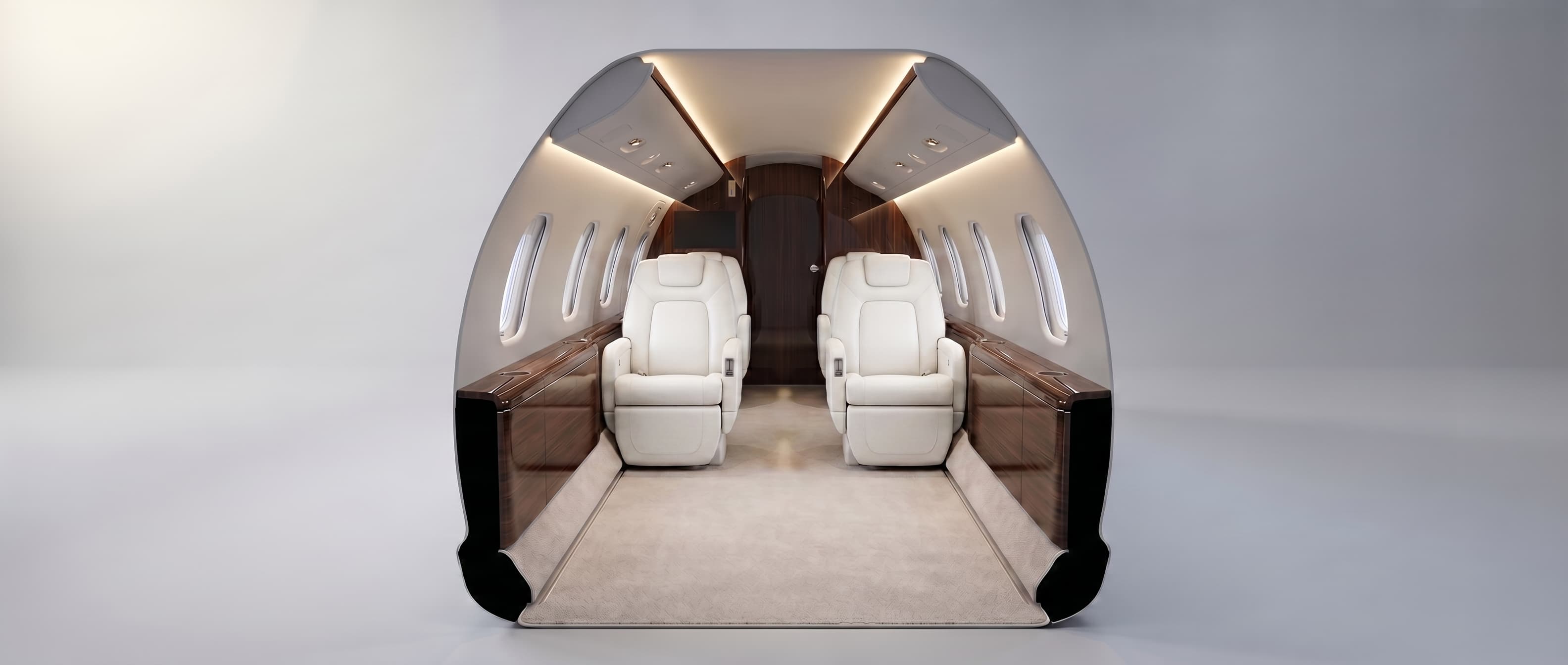 Refined private jet cabin with cream leather seating and polished walnut trim