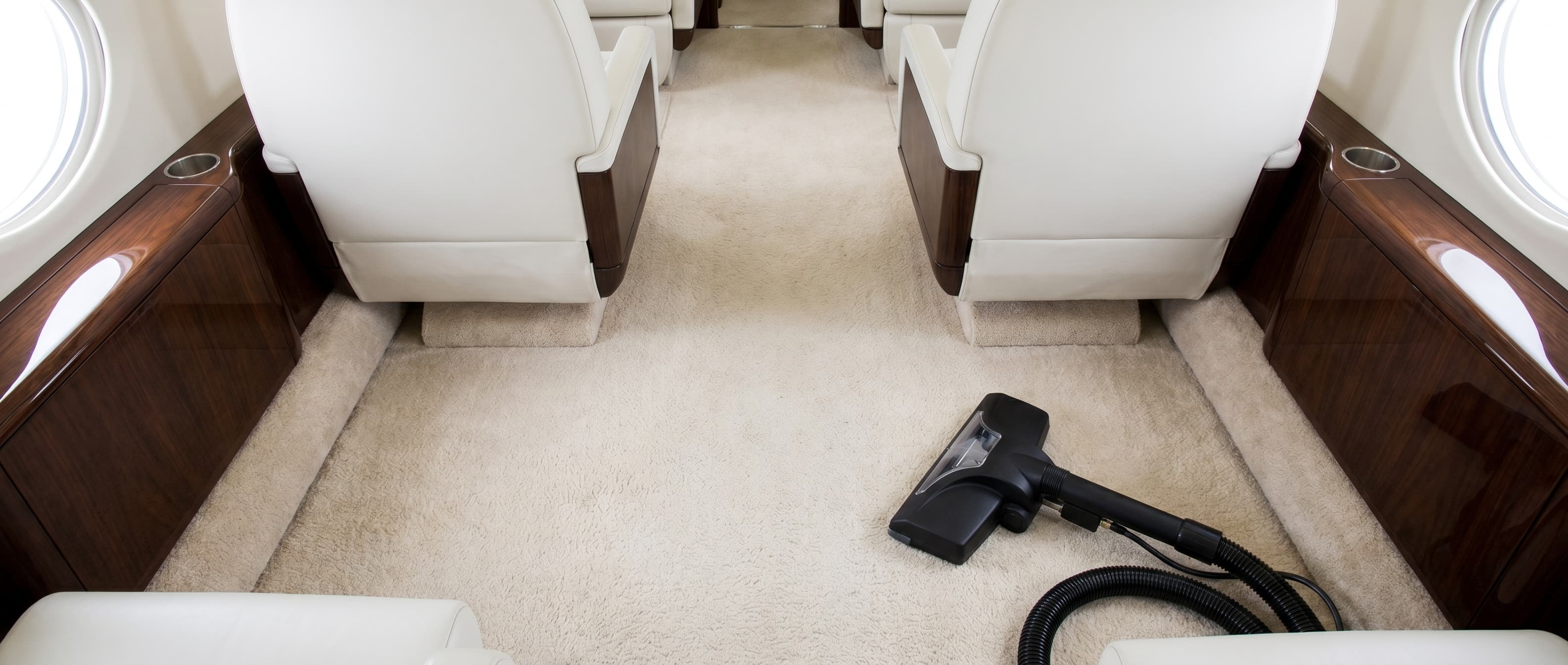 Aircraft cabin carpet, freshly extracted, with vacuum lines visible