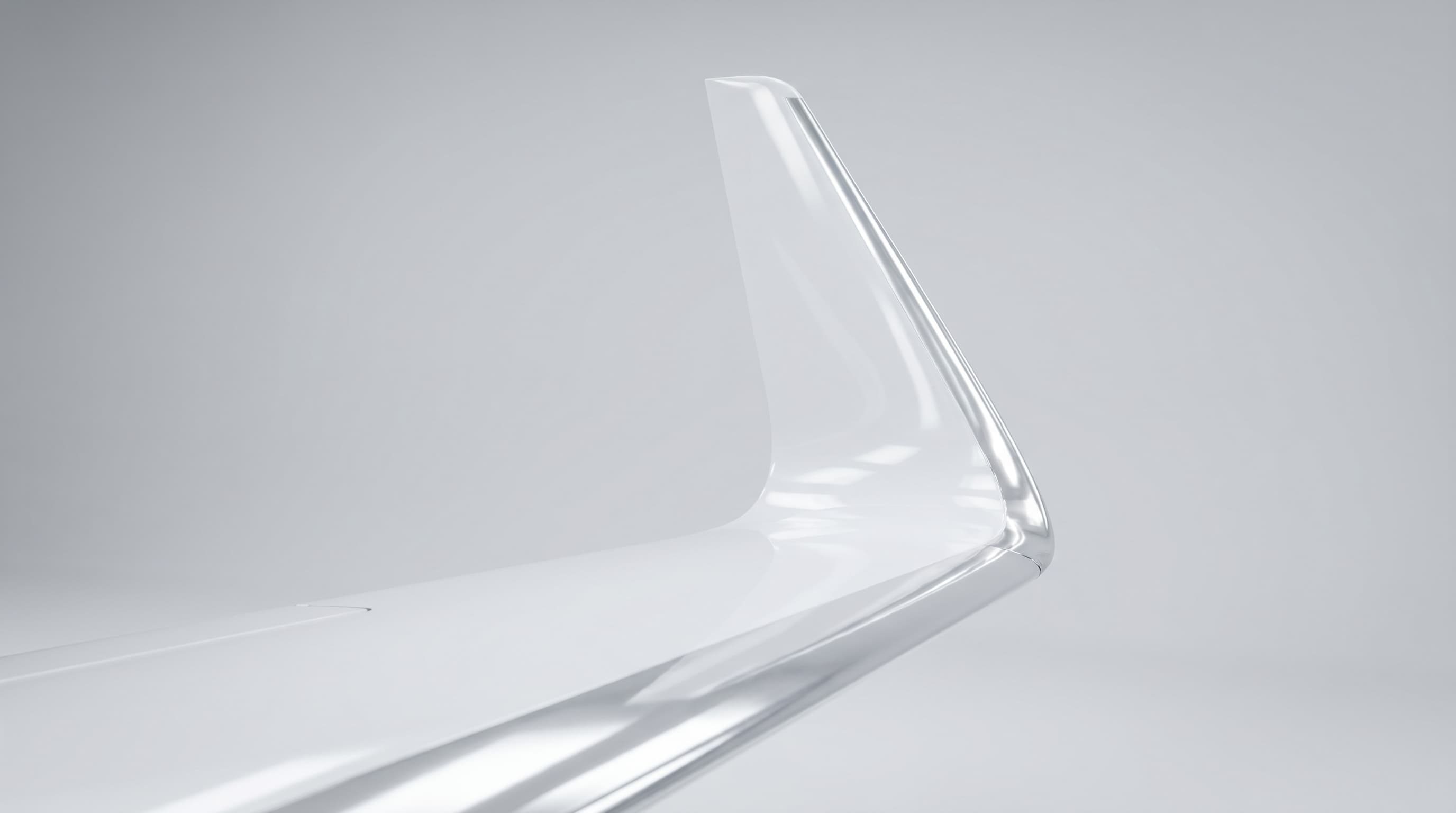 Mirror-finish private jet winglet under hangar studio lighting